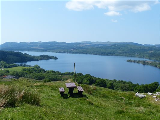 picnic table on a hill called An Sidhean on the farm, overlooking Loch Awe